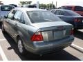 2006 Light Tundra Metallic Ford Focus ZX4 SE Sedan  photo #3