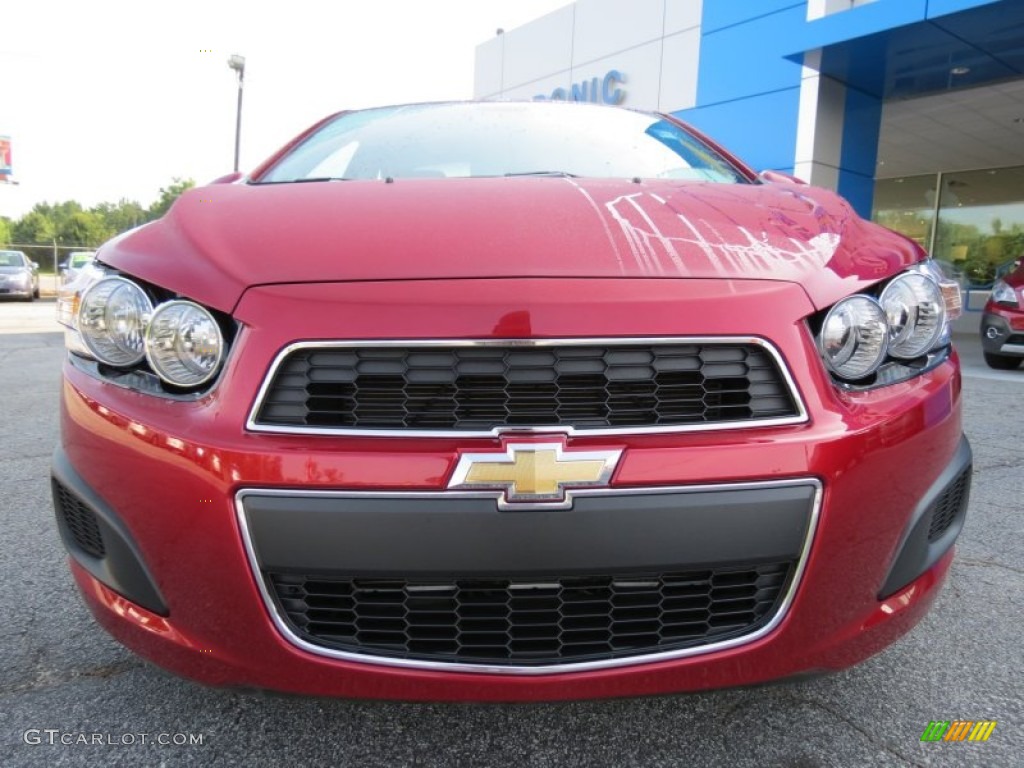 2012 Sonic LS Sedan - Crystal Red Tintcoat / Jet Black/Dark Titanium photo #2