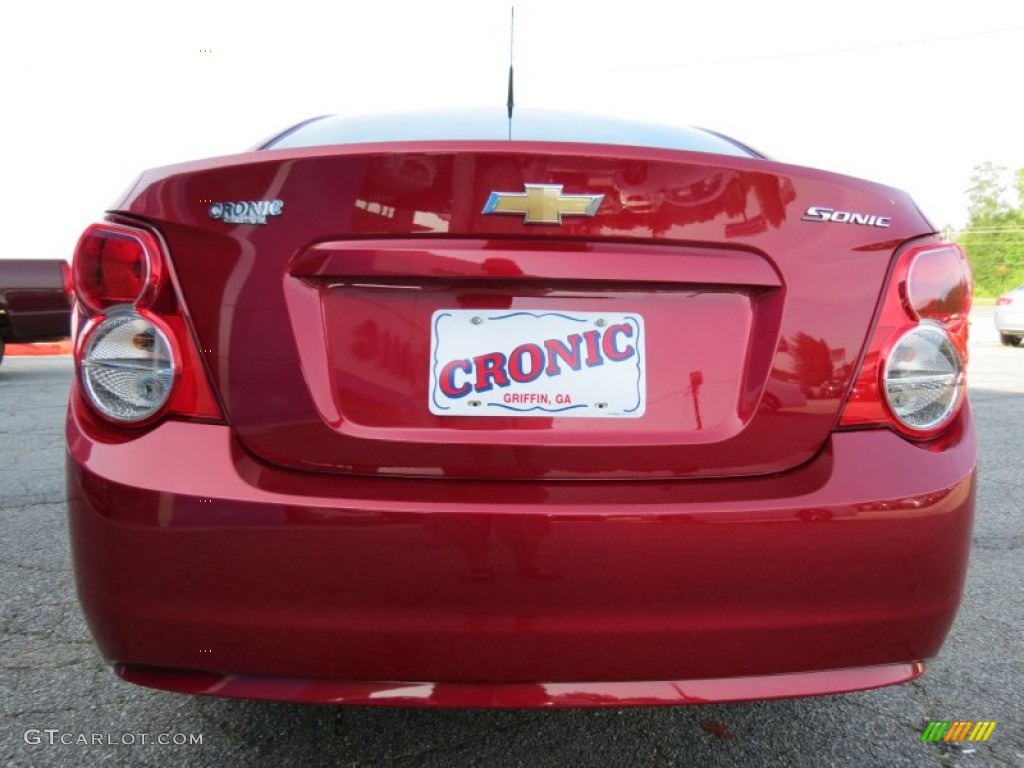 2012 Sonic LS Sedan - Crystal Red Tintcoat / Jet Black/Dark Titanium photo #6