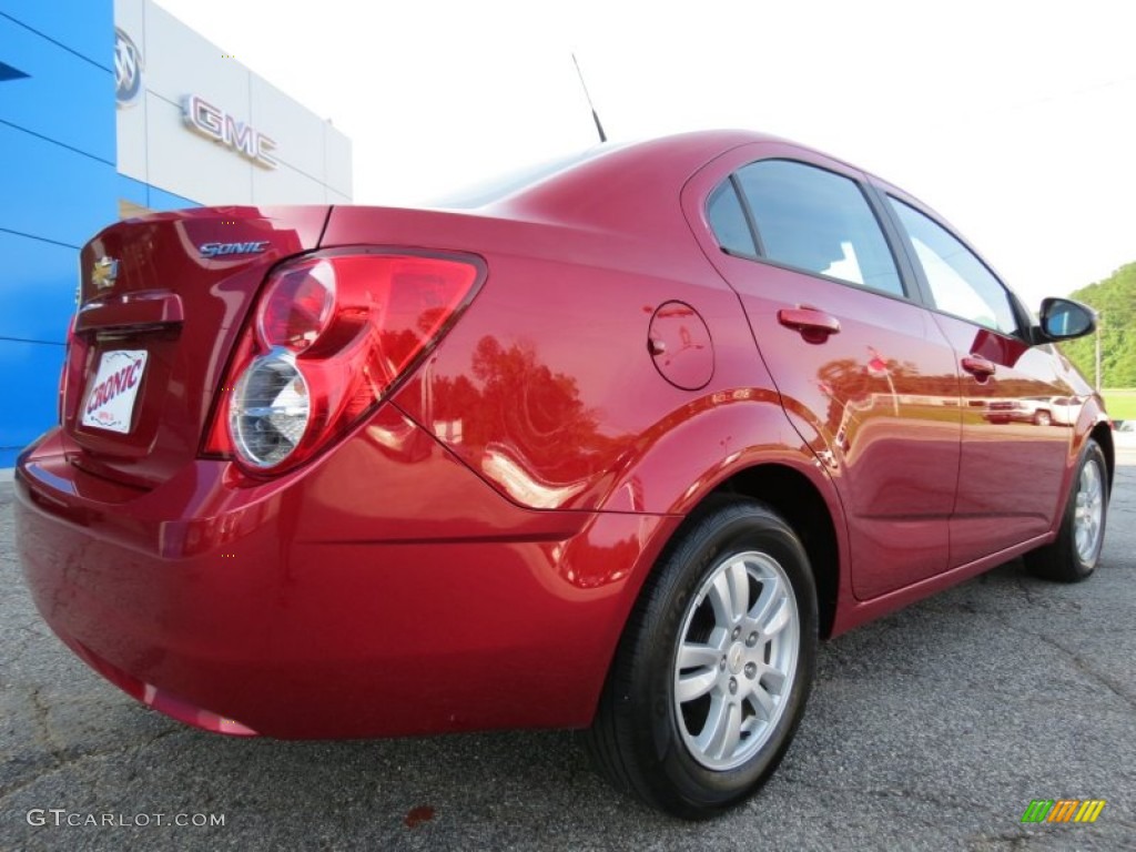 2012 Sonic LS Sedan - Crystal Red Tintcoat / Jet Black/Dark Titanium photo #7