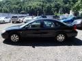 2004 Black Ford Taurus SEL Sedan  photo #5