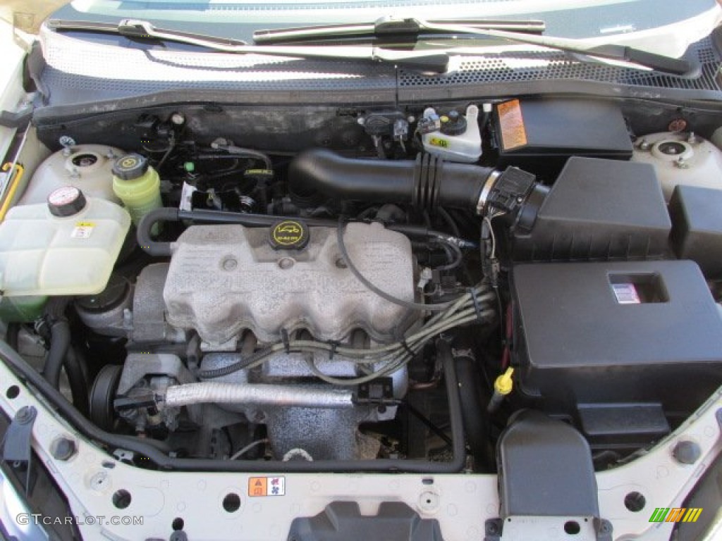 2002 Focus LX Sedan - Fort Knox Gold / Medium Graphite photo #9