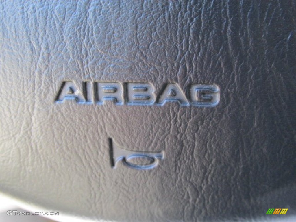 2002 Focus LX Sedan - Fort Knox Gold / Medium Graphite photo #14