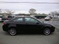 2009 Ebony Black Ford Focus SES Coupe  photo #8