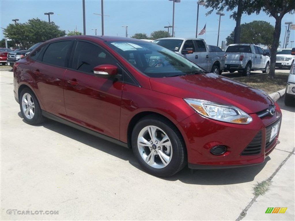 Ruby Red 2014 Ford Focus SE Sedan Exterior Photo #83910145