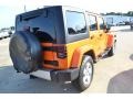 2012 Crush Orange Jeep Wrangler Unlimited Sahara 4x4  photo #6