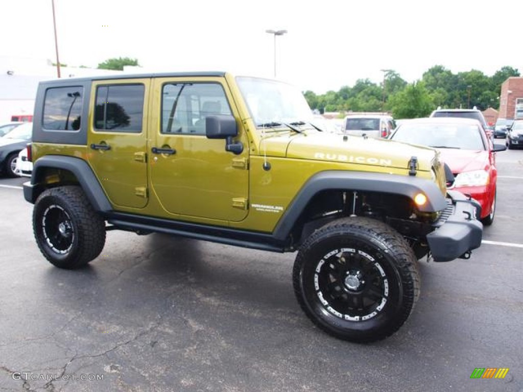 Rescue Green Metallic 2010 Jeep Wrangler Unlimited Rubicon 4x4 Exterior Photo #83949085