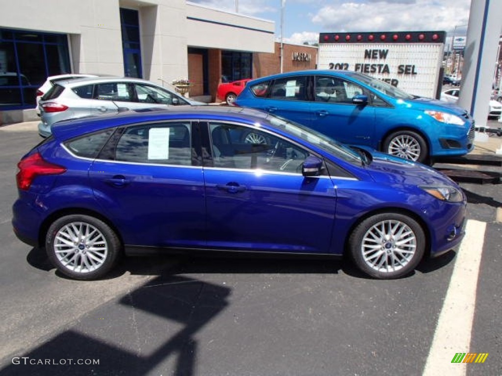 2014 Focus Titanium Hatchback - Performance Blue / Arctic White photo #1