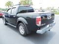 2010 Super Black Nissan Frontier LE Crew Cab 4x4  photo #3