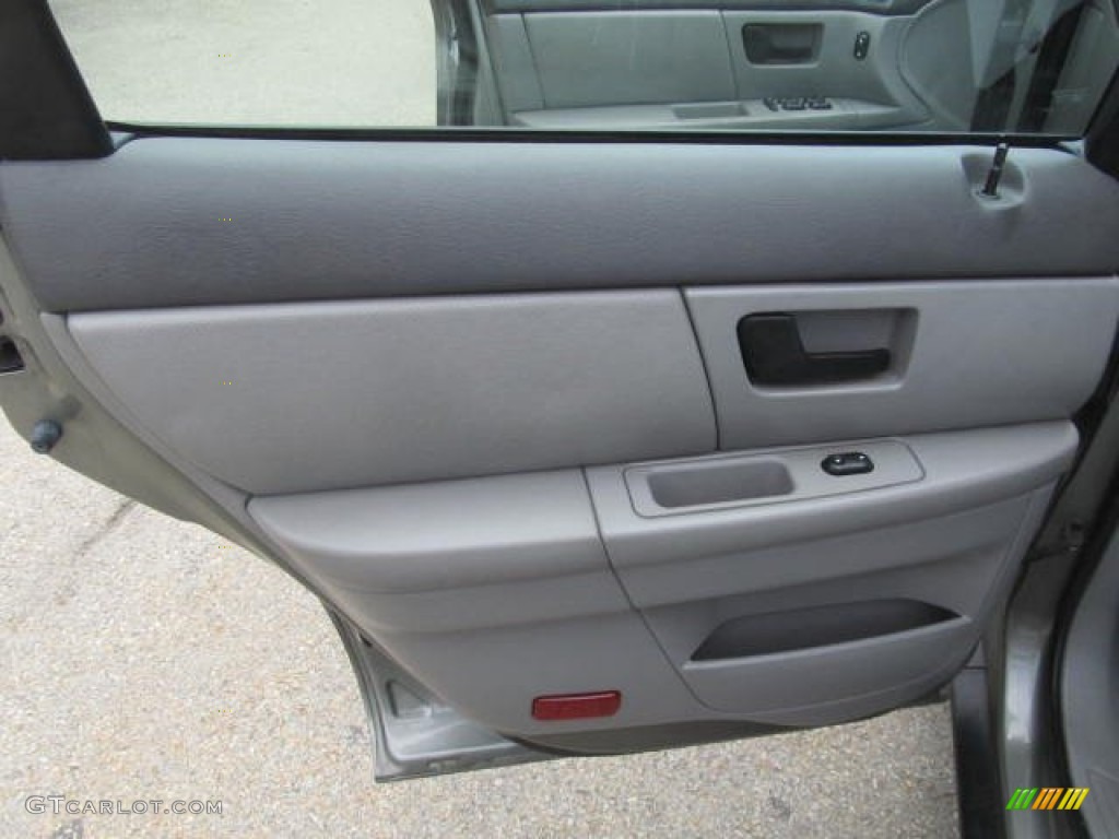 2003 Ford Taurus SE Medium Graphite Door Panel Photo #83997246