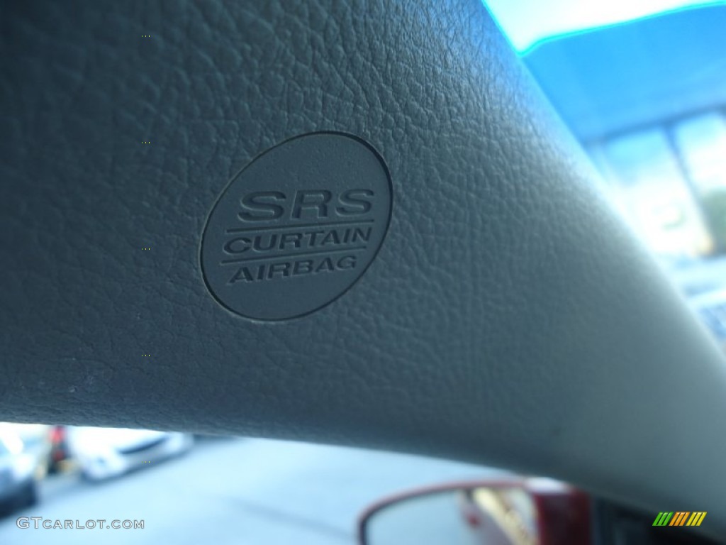 2004 Maxima 3.5 SL - Red Opulence / Black photo #32