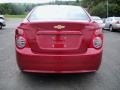 2013 Crystal Red Tintcoat Chevrolet Sonic LS Sedan  photo #6