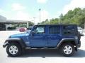 2010 Deep Water Blue Pearl Jeep Wrangler Unlimited Sport 4x4  photo #2