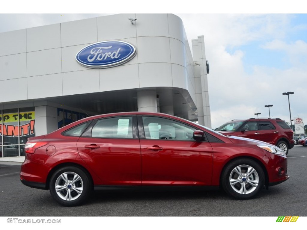 Ruby Red 2014 Ford Focus SE Sedan Exterior Photo #84096476