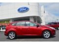 2013 Ruby Red Ford Focus SE Hatchback  photo #2