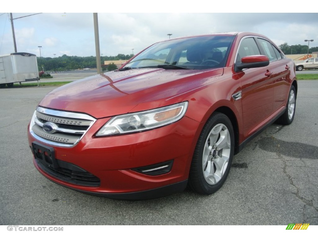 2010 Taurus SEL - Cinnamon Red Metallic / Charcoal Black photo #1