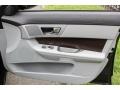 Dove/Warm Charcoal Door Panel Photo for 2012 Jaguar XF #84111493