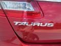  2014 Taurus SEL Logo