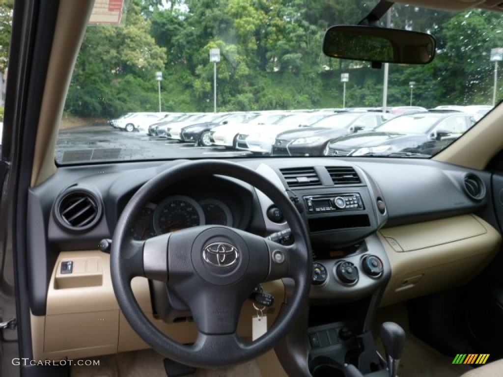 2011 Toyota RAV4 I4 4WD Sand Beige Dashboard Photo #84195620