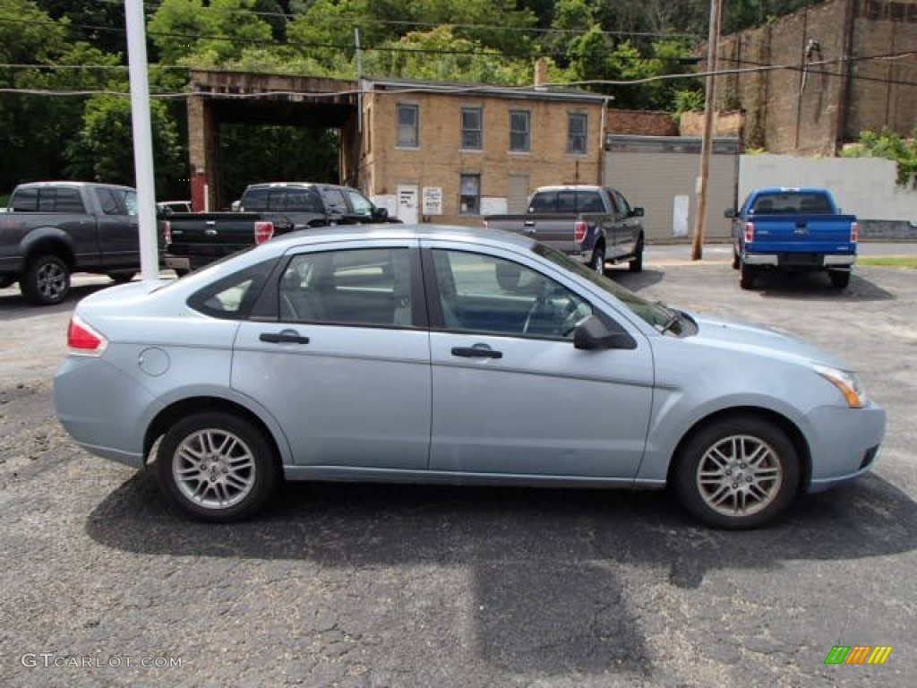 2009 Focus SE Sedan - Light Ice Blue Metallic / Medium Stone photo #1