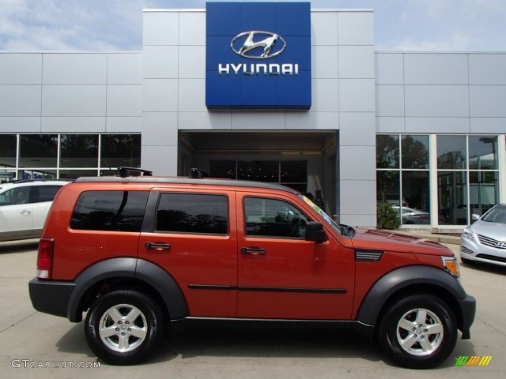 2007 Nitro SXT 4x4 - Sunburst Orange Pearl / Dark Slate Gray/Light Slate Gray photo #1