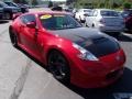 2010 Solid Red Nissan 370Z NISMO Coupe  photo #3