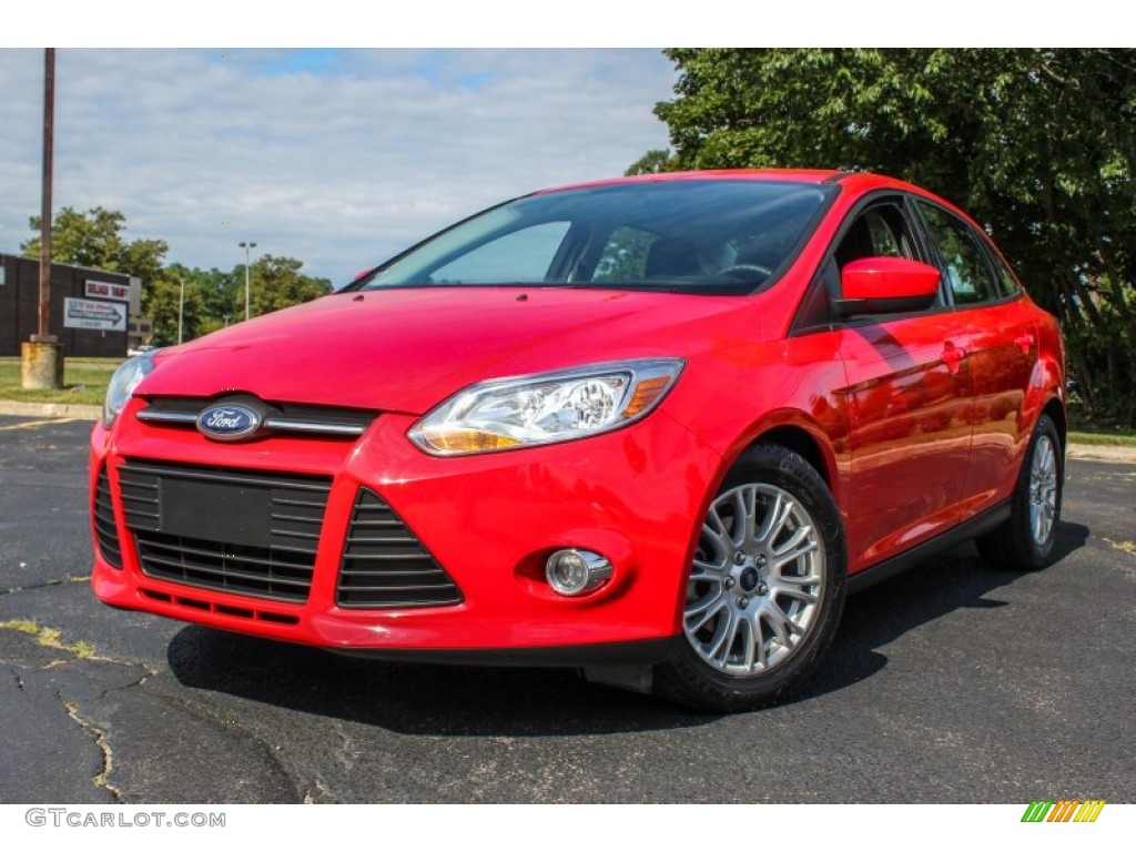 Race Red 2012 Ford Focus SE Sedan Exterior Photo #84312860