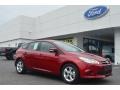 2014 Ruby Red Ford Focus SE Hatchback  photo #1