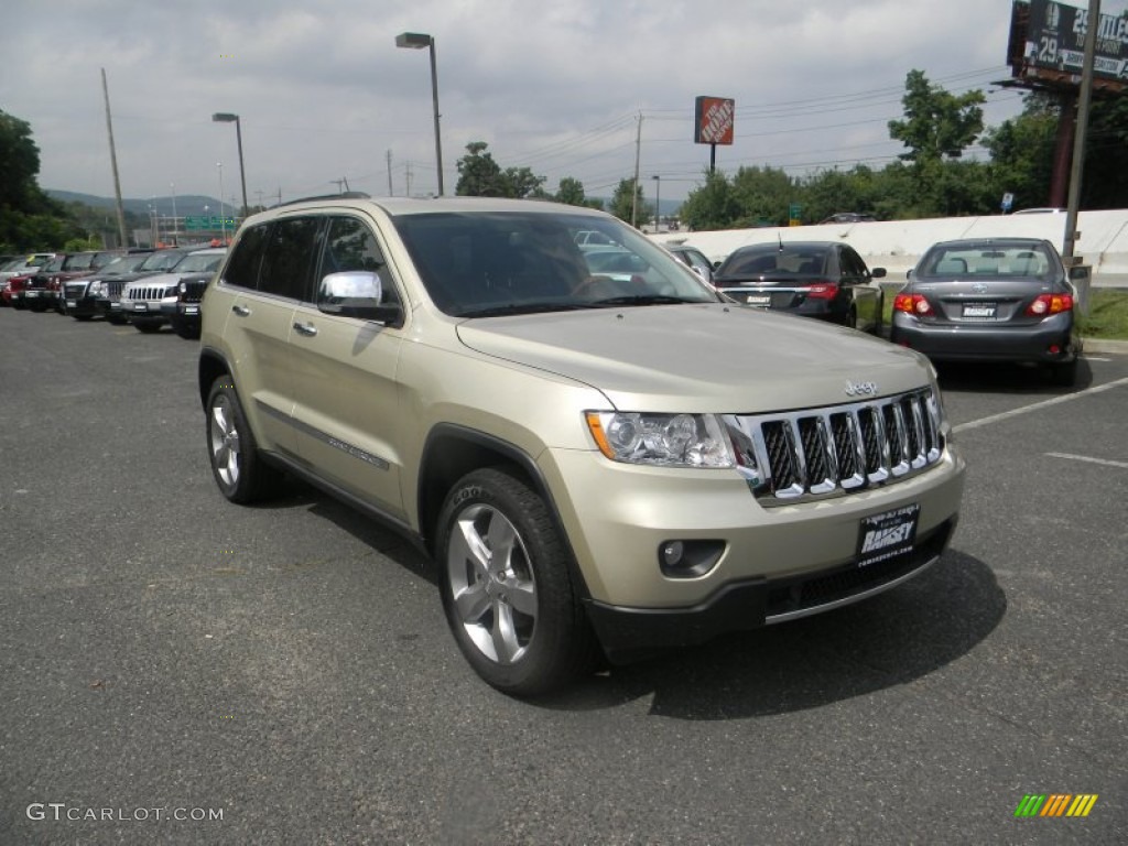 2011 Grand Cherokee Overland 4x4 - White Gold Metallic / New Saddle/Black photo #1