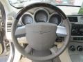 2008 Chrysler Sebring Medium Pebble Beige/Cream Interior Steering Wheel Photo