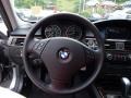 Black 2011 BMW 3 Series 335i xDrive Sedan Steering Wheel