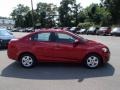 2013 Crystal Red Tintcoat Chevrolet Sonic LS Sedan  photo #1