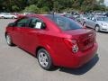 2013 Crystal Red Tintcoat Chevrolet Sonic LS Sedan  photo #6