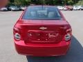 2013 Crystal Red Tintcoat Chevrolet Sonic LS Sedan  photo #7
