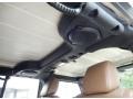 2011 Jeep Wrangler Unlimited Black/Dark Saddle Interior Audio System Photo