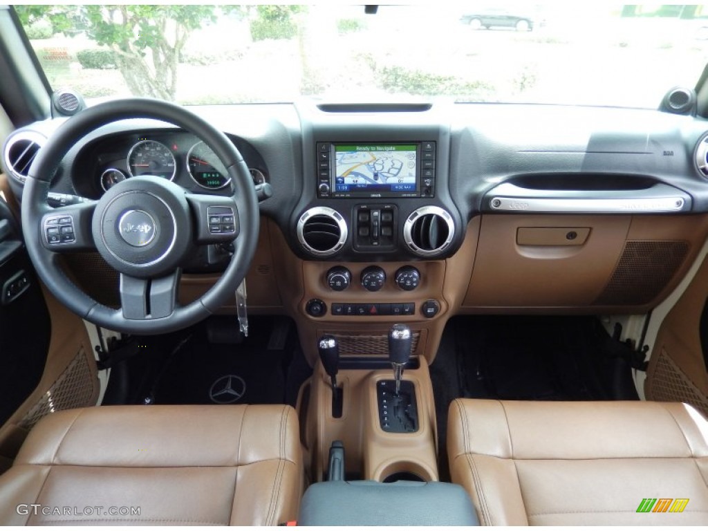 2011 Jeep Wrangler Unlimited Sahara 4x4 Black/Dark Saddle Dashboard Photo #84504921