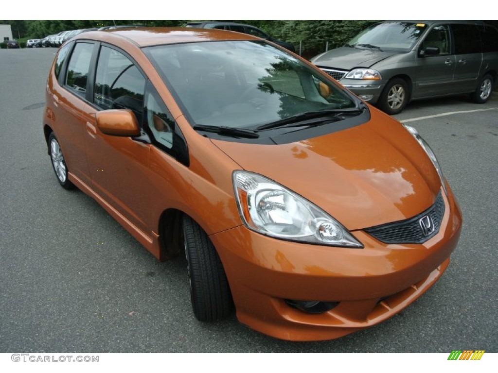 Orange Revolution Metallic 2010 Honda Fit Sport Exterior Photo #84527617