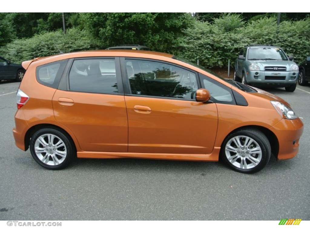 Orange Revolution Metallic 2010 Honda Fit Sport Exterior Photo #84527641