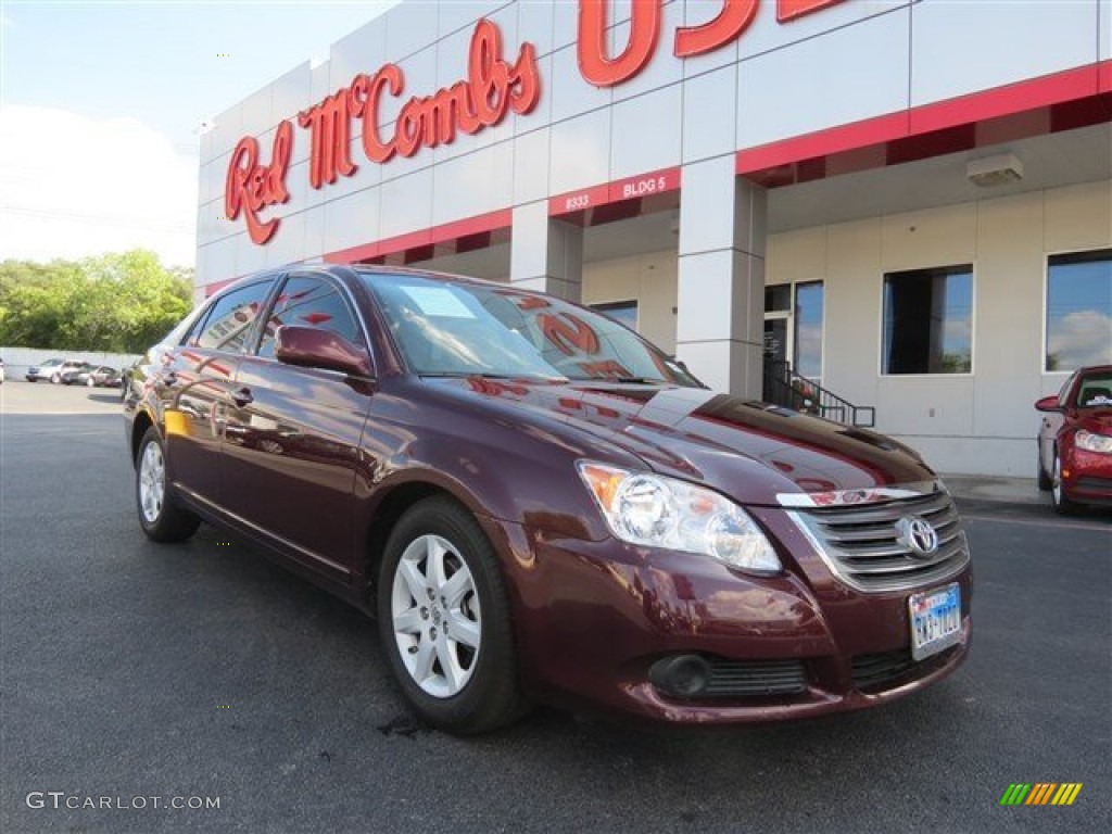 2010 Avalon Limited - Cassis Red Pearl / Ivory photo #1