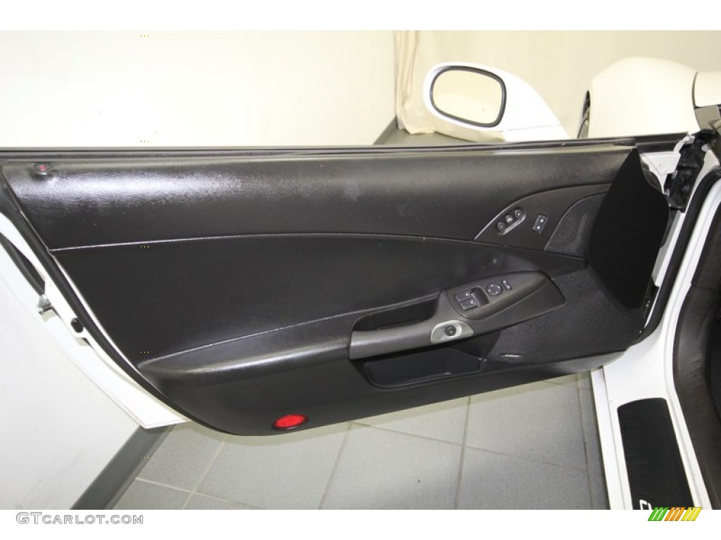 2005 Chevrolet Corvette Coupe Ebony Door Panel Photo #84667988