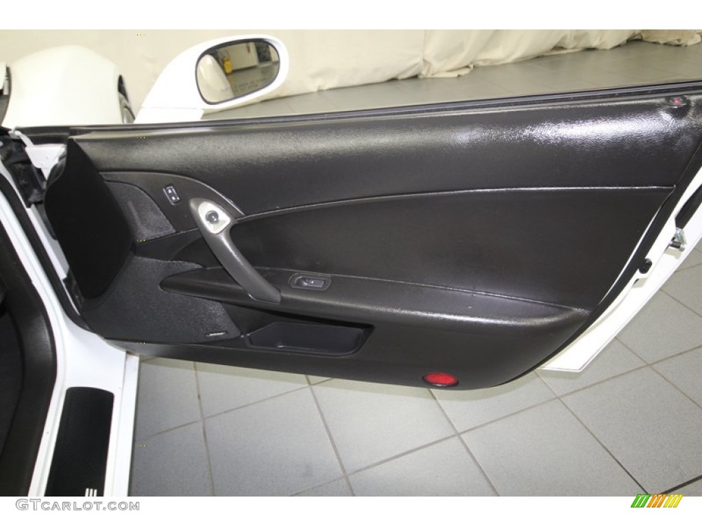 2005 Chevrolet Corvette Coupe Ebony Door Panel Photo #84668036