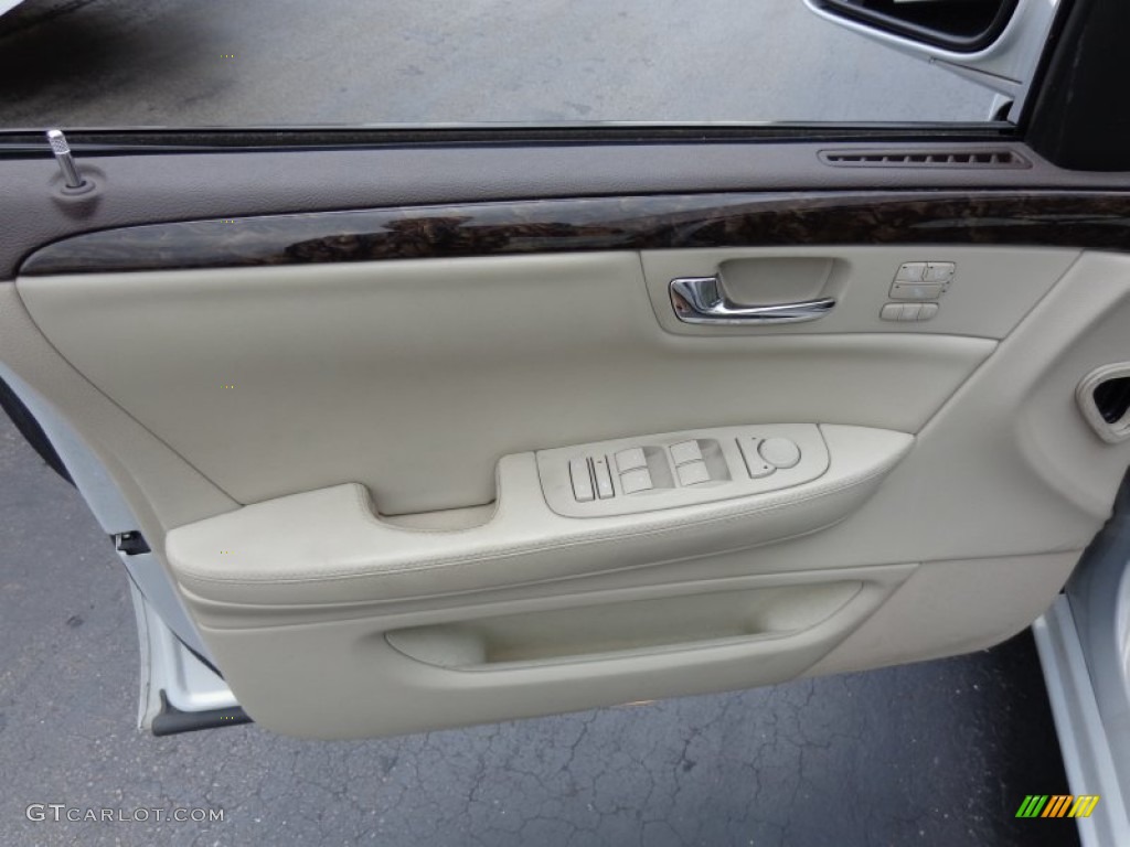 2009 Cadillac DTS Standard DTS Model Shale/Cocoa Door Panel Photo #84675338