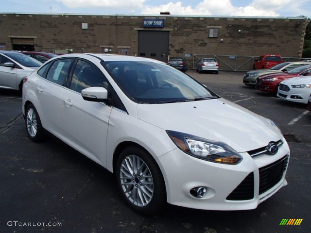 White Platinum 2014 Ford Focus Titanium Sedan Exterior Photo #84687200