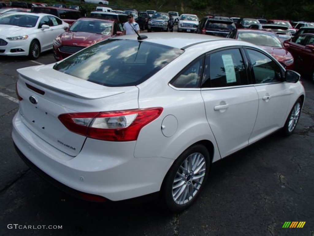 White Platinum 2014 Ford Focus Titanium Sedan Exterior Photo #84687305