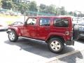 2011 Deep Cherry Red Jeep Wrangler Unlimited Sahara 4x4  photo #4