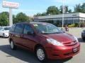 2010 Salsa Red Pearl Toyota Sienna LE AWD  photo #1