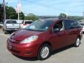 2010 Salsa Red Pearl Toyota Sienna LE AWD  photo #3