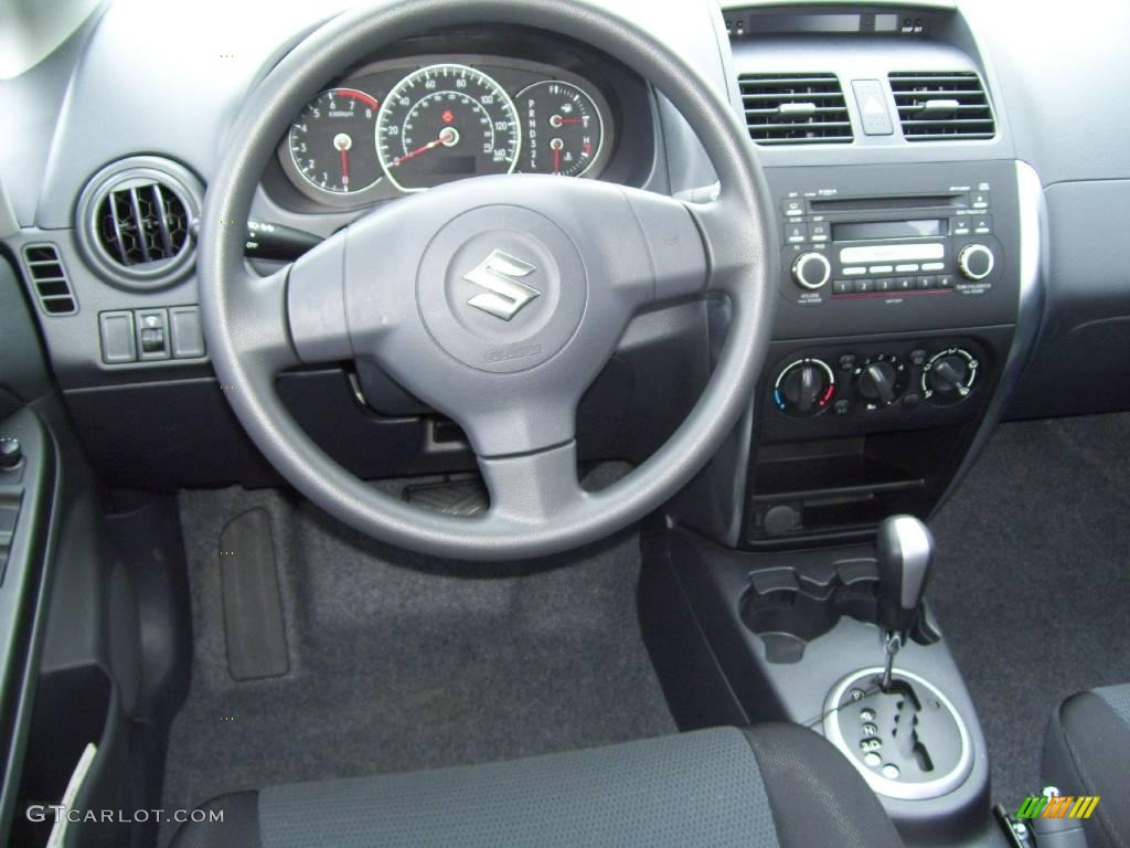 2008 SX4 Sedan - Cherry Red Metallic / Black photo #9