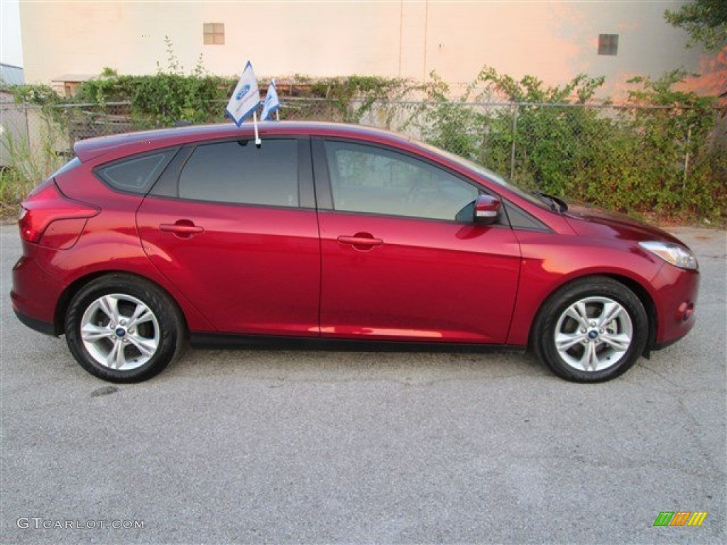 Ruby Red 2013 Ford Focus SE Hatchback Exterior Photo #84749321