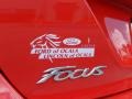 2014 Race Red Ford Focus SE Hatchback  photo #4
